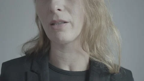 Speaking. Portrait of part of the face of a pleasant Caucasian woman who is talk Stock Footage 233009936