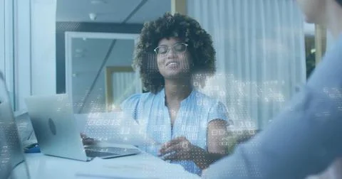 Speaking professional gesturing with digital overlay at office meeting table, 스톡 사진