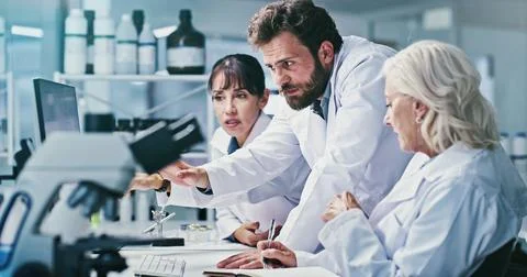 Speaking, science or people with computer in lab, procedure report or plann.. Stock Photos