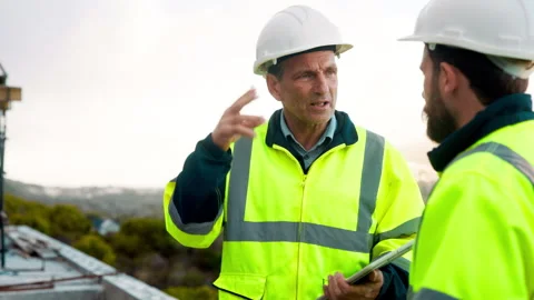 Speaking, team or architect with planning at construction site, engineering Stock Footage 336201716