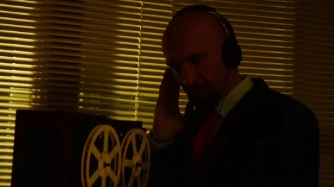 Special agent scout listens to conversations and makes a record on the tape 7 Video stock 98817545