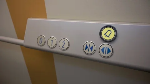 Special buttons for the disabled in one elevator Stock Footage 121531317