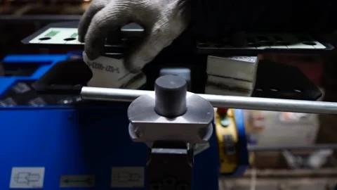 A special device bends metal bars Stock Footage 145426758