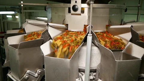 Special device for sorting and packing pasta at the factory. Stock Footage 185425721