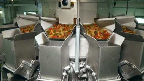 Special device for sorting and packing pasta at the factory Stock Footage 185428428