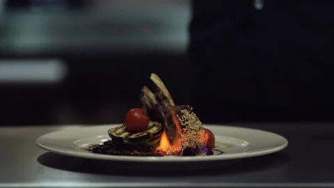 A special dish from the chef. Burning Lamb Karee Stock Footage 129851692