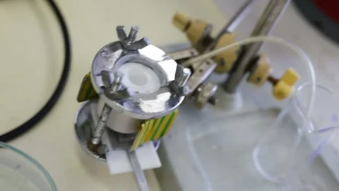 Special DIY Electrolytic cell stands on the table. Real-time, inside the General Stock Footage 85615206