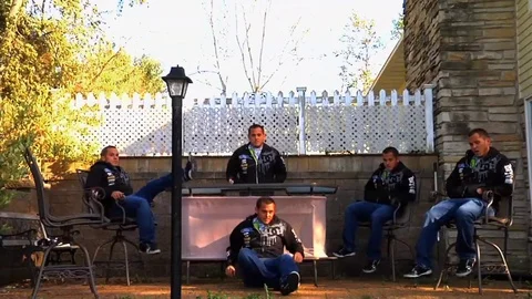 Special effect of a man sitting with five copies of himself. 스톡 동영상 71360911