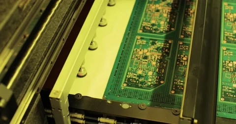 A special equipment is moving and testing of electronic boards. Stock Footage 201211629