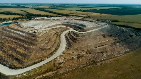 Special Equipment Works At A Garbage Dump. Huge Garbage Dump view from drone Vídeos de archivo 114472714