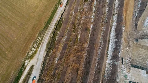 Special Equipment Works At A Garbage Dump. A huge Garbage Dump view from the Stock Footage 114494419