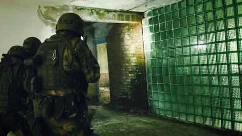 Special forces attack terrorist on 2 floor Stock Footage 76755626