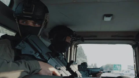 Special forces being transported in a car Stock Footage 275091080