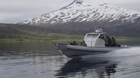 Special Forces On a Combat Boat Racing Across the Lake Stock Footage 120948042