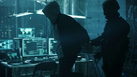 Special Forces Cybersecurity Agent Arrests, Handcuffs Dangerous Hacker Stock Footage
