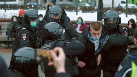 Special forces detained man demonstration. Police detaining protestor. Arrests. Stock Footage 147350895