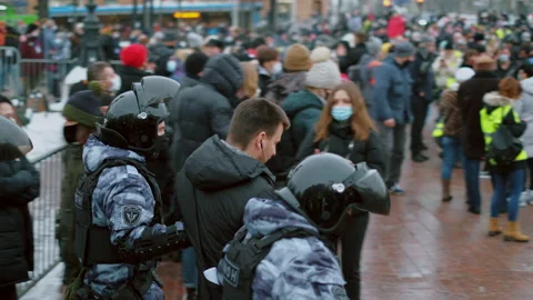 Special forces detained man at demonstration. Police detaining protestor. Arrest Stock Footage 147351052