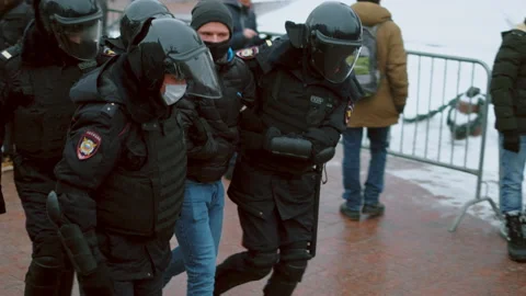 Special forces detained man demonstration. Police detaining protestor. Arrested. Stock Footage 147351236