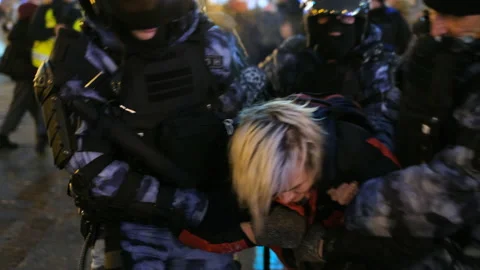 Special forces detained man at demonstration. Police detaining protestor. Arrest Stock Footage 147351951