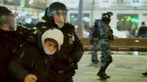 Special forces detained man at demonstration. Police detaining protestor. Arrest Stock Footage 147352042
