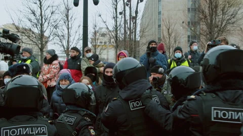 Special forces detained man at demonstration. Police detaining protestor. Arrest Stock Footage 147352406