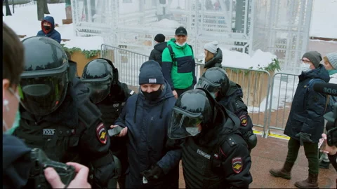 Special forces detained man demonstration. Police detaining protestor. Arrested Stock Footage 147352731