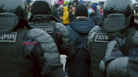 Special forces detained man demonstration. Police detaining protestor. Arrested. Video stock 147410803