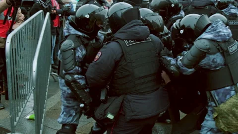 Special forces detained man demonstration. Police detaining protestor. Arrested. Stock Footage 147410854