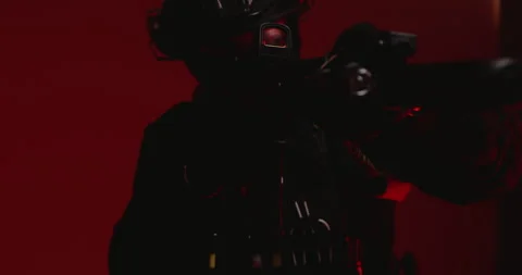 A special forces operative aiming an AR-15 Stock Footage 274744435