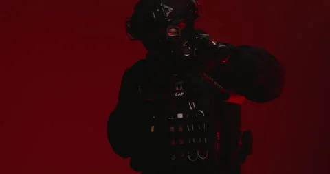 A special forces operative aiming an AR-15 Stock Footage 274744857
