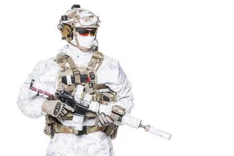 Special forces operator in winter camo clothes Stock Photos