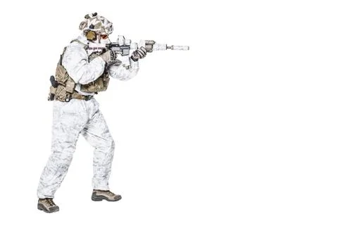 Special forces operator in winter camo clothes Stock Photos