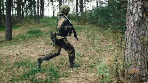 Special forces running Stock Footage 76755686