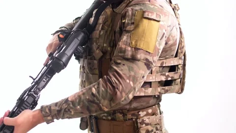 Special Forces scout with a flak jacket and a combat rifle in his hands Stock Footage 158013064