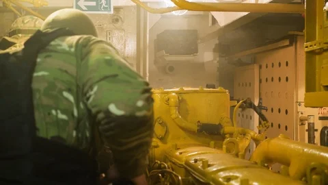 Special forces in search of terrorists. Engine room of the vessel. Video stock 117179148