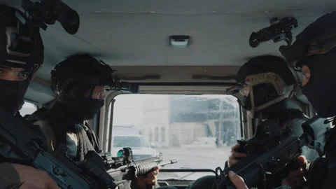 Special forces sitting In a car Stock Footage 275091286