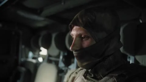 Special forces sniper puts on sniper headphones. Stock Footage 327353133