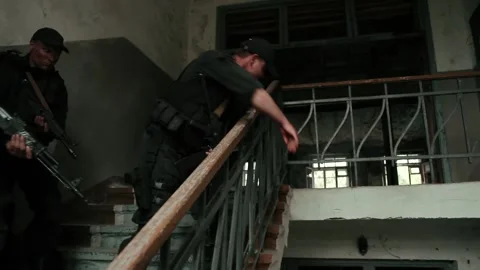 A special forces soldier throws a grenade. Stock Footage 195988480