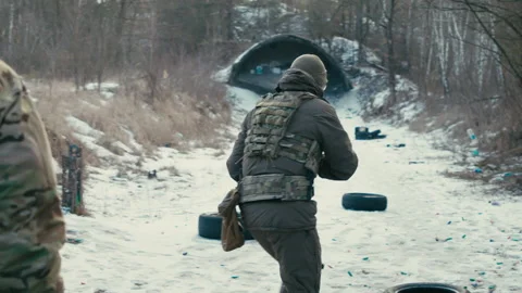 Special forces soldier training.. Shooting and running over. 4K slow motion Video stock 174367771