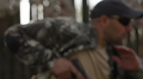 Special forces solider exercise shooting a gun while running at military camp Stock Footage 64377849