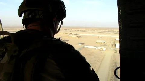 Special Forces Taking Off in Blackhawk over Afghan Desert  Stock Footage 690419
