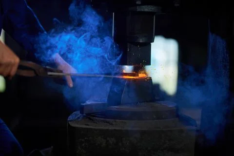 Special heating tools for making gate in smithy. Stock Photos