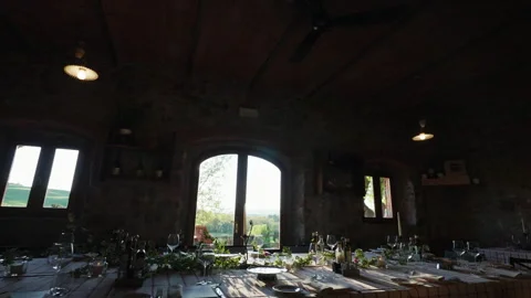 Special interior design of ancient restaurant with stone walls, arch windows and Stock Footage 267094679