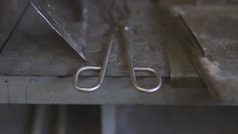 Special laboratory tool for holding high temperature objects on a metal table Stock Footage 124552113