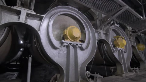 Special large cylinders of paper web drying conveyor in workshop Stock Footage 294201415