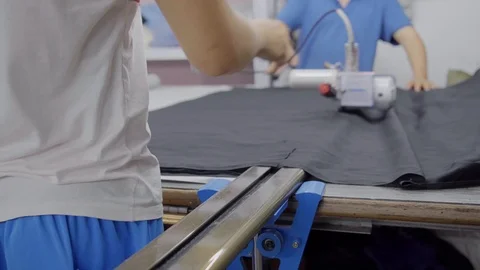 A special machine for cutting layer of cloth before sewing Stock Footage 89716475