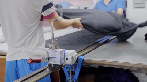 A special machine for cutting layer of cloth before sewing Stock Footage 89716818