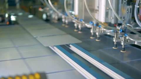 Special machine packs solar panels in row, close up. Stock-Footage 98623934
