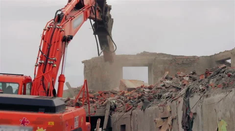 Special machinery destroys old buildings Stock Footage 55881663