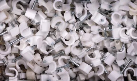 Special nails to attach wires to something Stock Photos